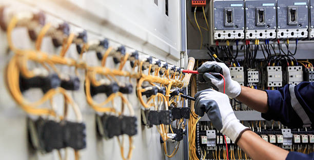 Professional Electrician technician working in East Milton, FL